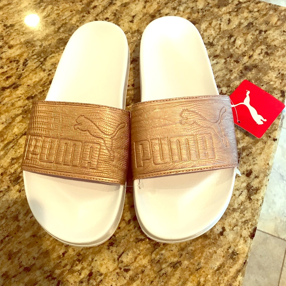 Women’s rose gold Puma sandals brand new sz 8.5